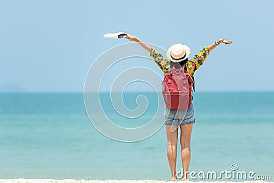 Happy traveler and tourism women travel summer on the beach.Â  Stock Photo